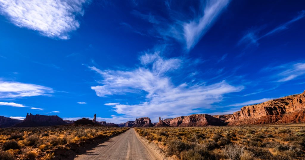 Blue skies over desert road stretching into the distance - OCD TREATMENT IN CHANDLER, AZ